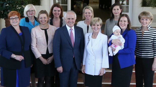 "Fifty-fifty the ideal": Malcolm Turnbull with the female members of his cabinet.