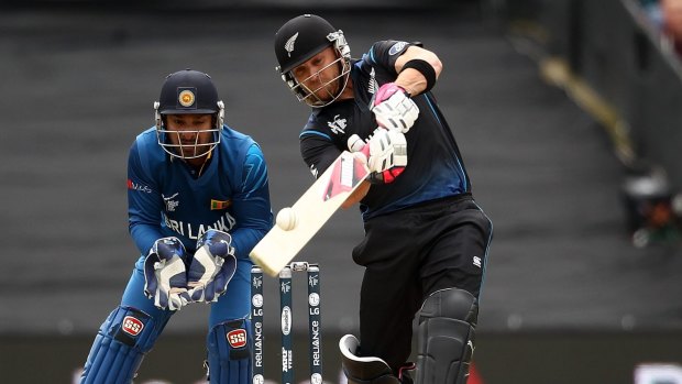 New Zealand's Brendon McCullum thumps another ball down the ground.