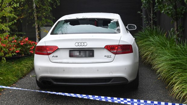 The back window of an Audi was shattered in the shooting.