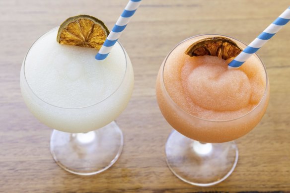 Margaritas, including these frozen lime and blood orange cocktails, are a repeat order at Repeat Offender.