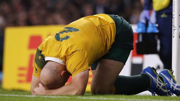 Pain: Australian captain Stephen Moore shortly before being substituted in his 100th Test.