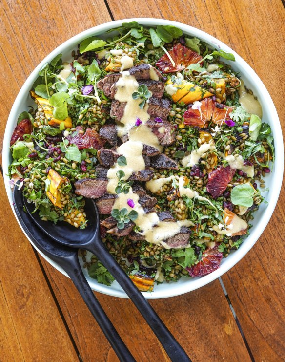 Use any grains as the base of this warm steak salad.