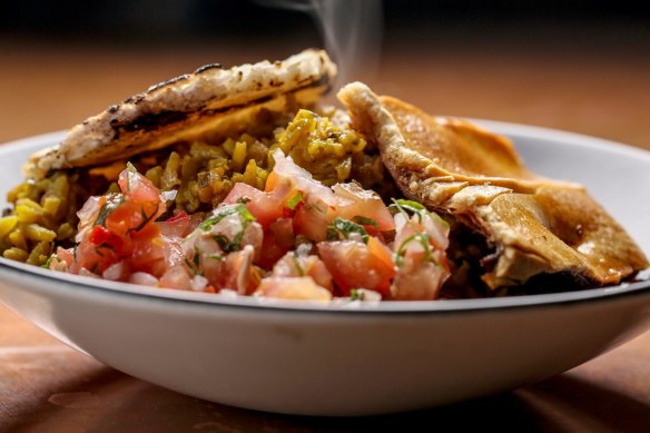 Signature dish: Lechona Berbeo pilaf-stuffed pork.