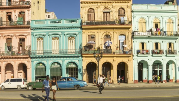 People crossing the Paseo Marti in Havana, Cuba.