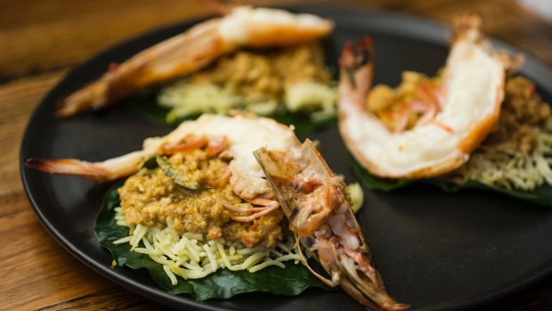King prawn on betel leaf with prawn and coconut curry.