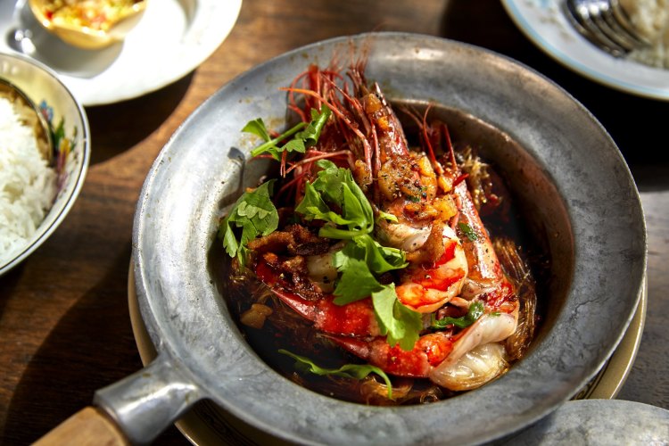 Baked tiger prawns with vermicelli at Porkfat Thai restaurant in Sydney.