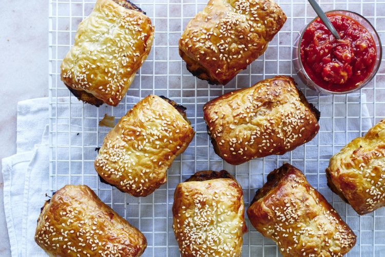 Lamb, beef and vegetable sausage rolls with pistachios.