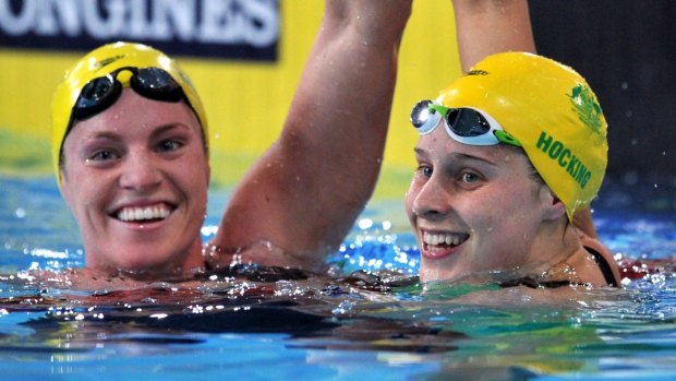 Australia's Belinda Hocking (R) and Emily Seebohm celebrate their 1-2 finish in the 200m backstroke. 