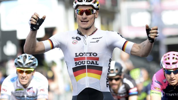 Andre Greipel of Germany celebrates after winning stage six.