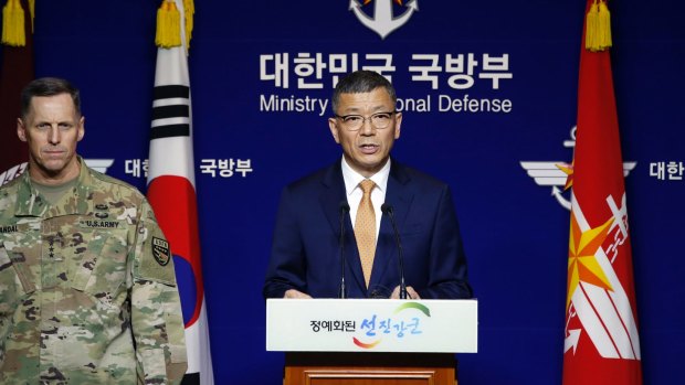 South Korean Defense Ministry's Deputy Minister for Policy Yoo Jeh-seung, center, and US Lieutenant General Thomas Vandal, left, speak to the media in July, 2016, about deploying THAAD.