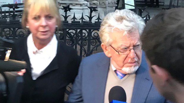 Australian entertainer Rolf Harris leaves a London court during his appeal on Tuesday.