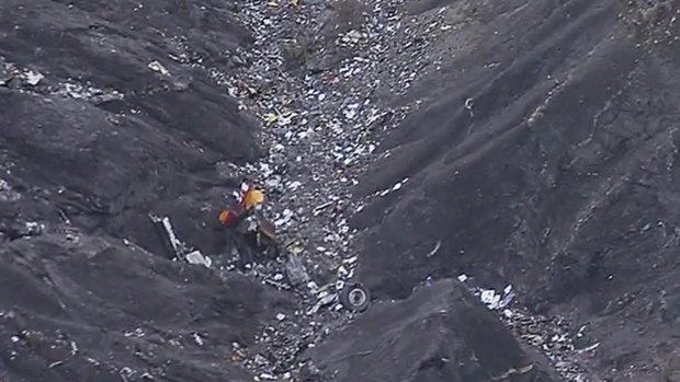 Debris scattered over the crash site near Seyne-les-Alpes in the French Alps on Tuesday.