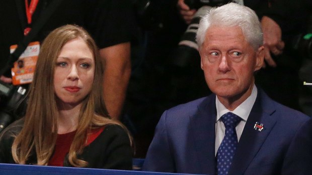 Former President Bill Clinton, with daughter Chelsea, looked uneasy throughout the debate.
