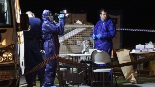 Forensic officers at the crime scene in Yanchep.