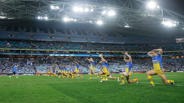 Stretched out: Eels players prepare for the round three match against the Canterbury Bulldogs