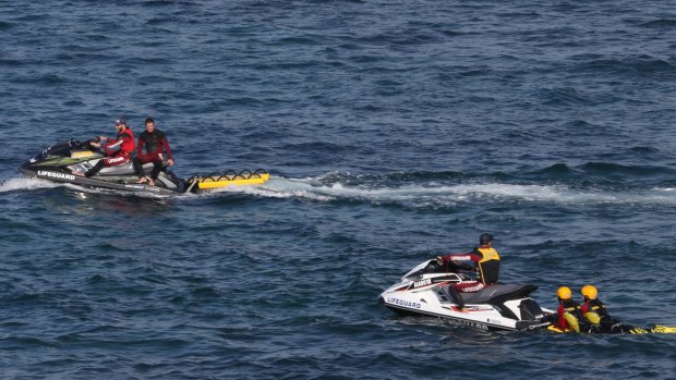 Jetskis search waters at Botany for Mr Nguyen.