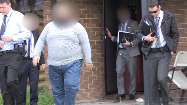 Isa Kocoglu was arrested after a dawn raid on his home in Hampton Park.