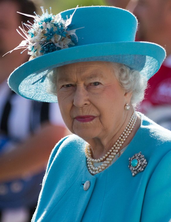 The Queen attends a prize-giving ceremony on a visit to the Malta Racing Club at Marsa racecourse near Valletta, Malta, on November 28 last year.