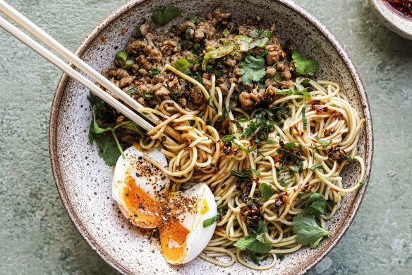 Serve this chicken noodle stir-fry with soft-boiled eggs and chilli oil.