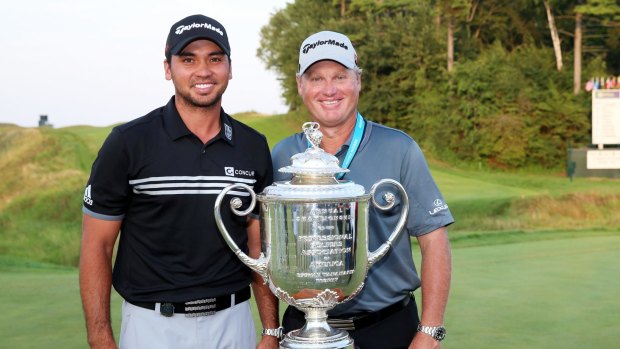 Jason Day and Canberra's Colin Swatton with the trophy after winning the 2015 PGA Championship.