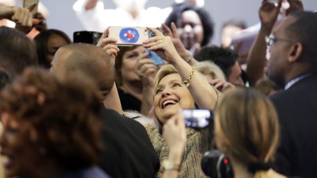 Hillary Clinton takes a selfie with supporters in Los Angeles. 