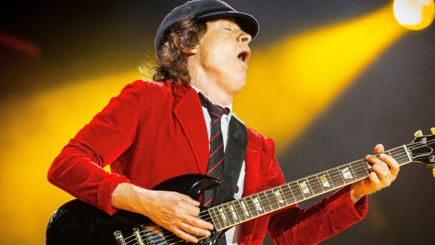 Guitarist Angus Young of AC/DC performs.