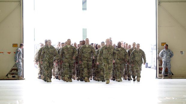 US Army troops arrive home last year. There are indications future homecomings may be delayed.