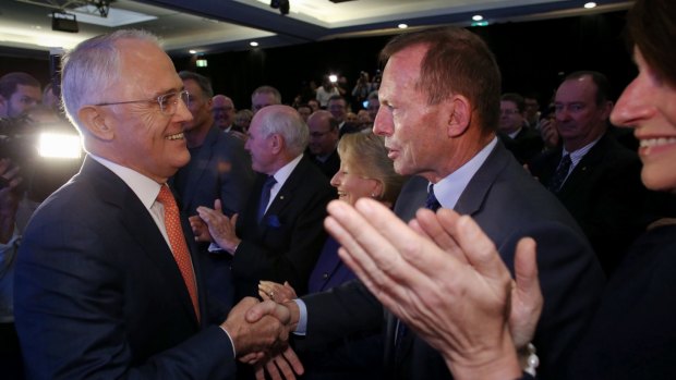 Mr Turnbull greets Mr Abbott before the launch.
