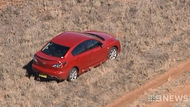 Stephanie Scott's car on the side of the road in a wheat field about eight kilometres from Leeton.