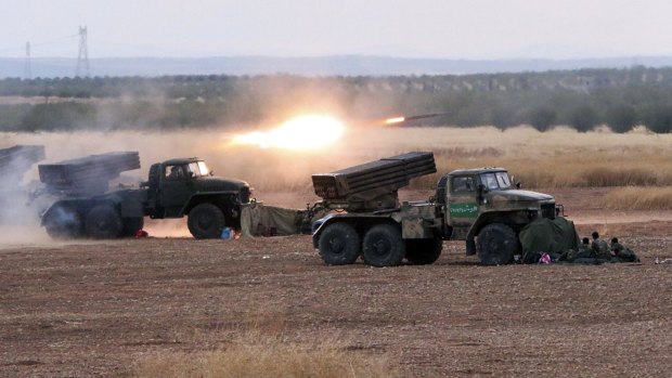 Syrian army rocket launchers in action against insurgent groups, which is being backed by Russian airstrikes. 