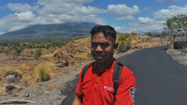 Nyoman Kastawan has stayed  inside the exclusion zone about eight kilometres from the summit of Agung.