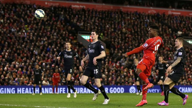 Liverpool's Daniel Sturridge, second right, scores the Red's second goal.
