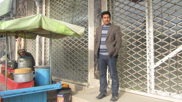 Aajan standing outside his soon-to-open restaurant, Labaik.