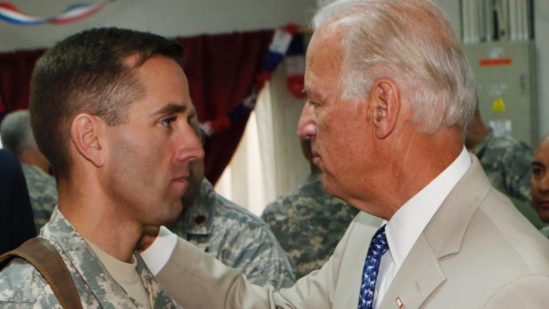 Joe Biden, right, talks with his son, US Army Captain Beau Biden, at Camp Victory on the outskirts of Baghdad, Iraq. Beau died from brain cancer in 2015 and Biden decided not to run for president in 2016 in the aftermath of his death.
