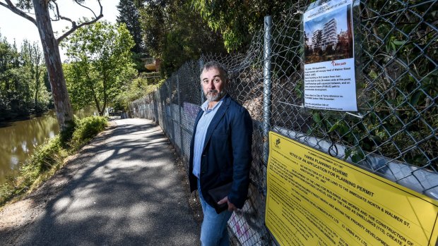 Yarra Riverkeeper Andrew Kelly, pictured in front of the Abbotsford site, says the proposed apartment tower is too high, and too close to the river's banks. 