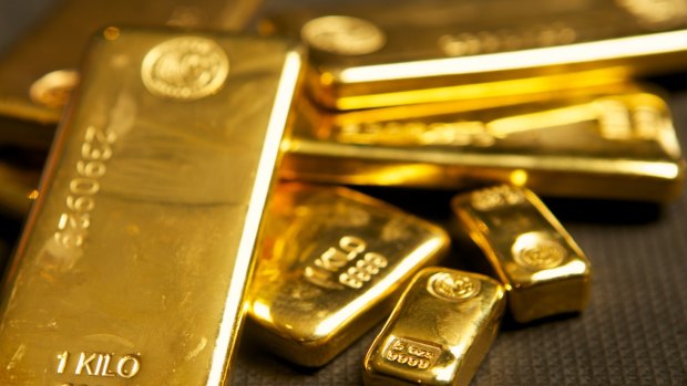 Some gold and silver bars at the Guardian Vaults on Williams Street. Neil Tremaine, Principal, Guardian Group. 2 October 2014.
The Age NEWS. Photo:Eddie Jim.