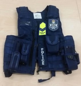 A police vest was among the items stolen from Palm Beach.