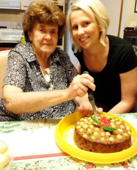 Premier Annastacia Palaszczuk's grandmother Beryl Erskine and Annastacia's sister Julia Tremble with the Queensland fruit cake.