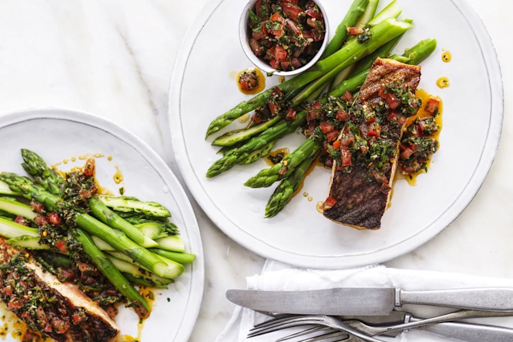 Grilled salmon with tomato and oregano dressing.