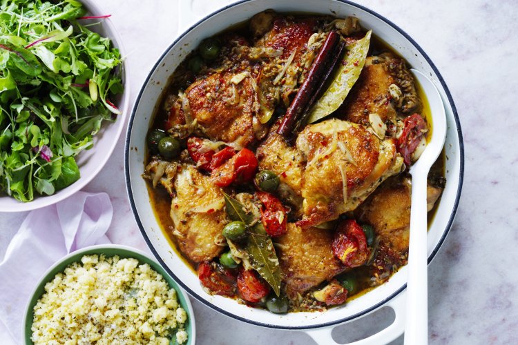 Pot-roasted chicken with tomato, olives, white wine cinnamon and Greek oregano.