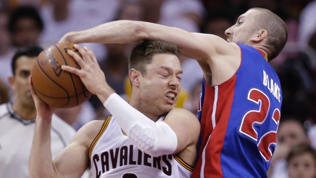 New signing: Steve Blake (right), seen here battling Australian Matthew Dellavedova, in the NBA, has joined the Sydney Kings.