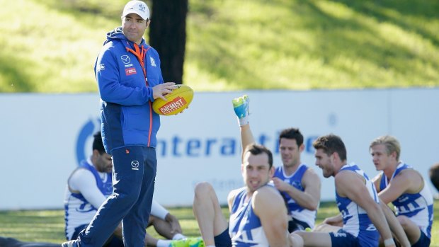 North coach Brad Scott and his Roos have a tough assignment against Hawthorn in the round 13 opener on Friday night. 