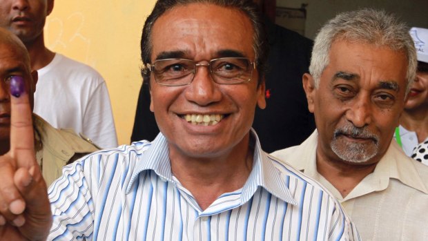 Fretilin leader Francisco "Lu-Olo" Guterres, left, is seen with former prime minister Mari Alkatiri, right, after voting in March.