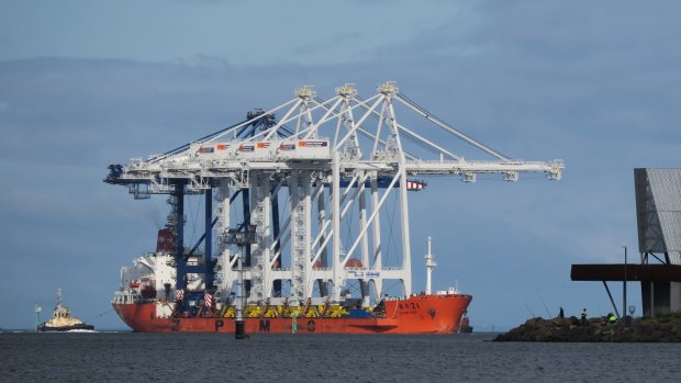 The huge ''post-Panamax'' cranes arrive at the Port of Melbourne.