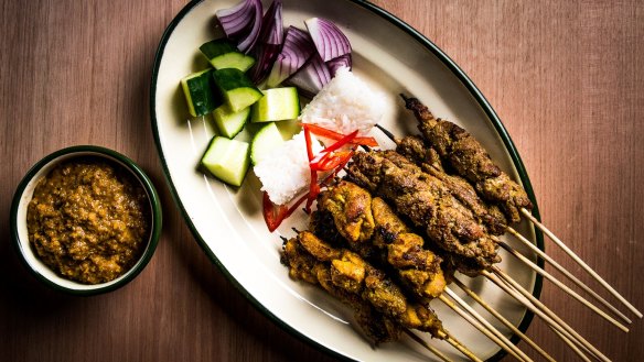 Chicken and beef satay with cucumber, onion, rice cakes and satay sauce at Chanteen.