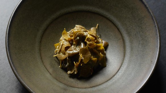 Veal tartare with rocket, summer's tomatoes and braised saltbush.