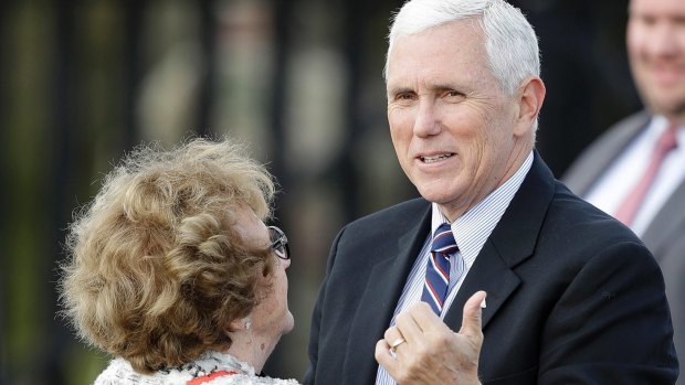 Mike Pence talks with his mum, Nancy Pence, after a Veterans Day ceremony on Friday.