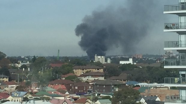 Smoke billows from a factory fire in Auburn.