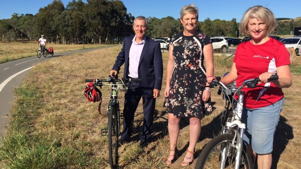 Pedal Power ACT's John Armstrong, Labor MLA Bec Cody and the Heart Foundation ACT's Anne Kentwell.