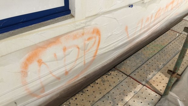 Graffiti uncovered last year on Old Parliament House appears to be from the mid-1980s, when the NDP was at its peak. 